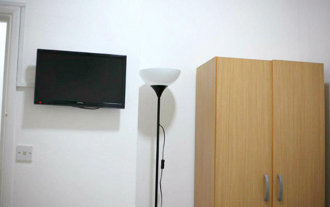 You will have a flat screen TV in your room