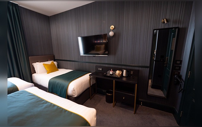 A typical quad room at Hyde Park Green Hotel