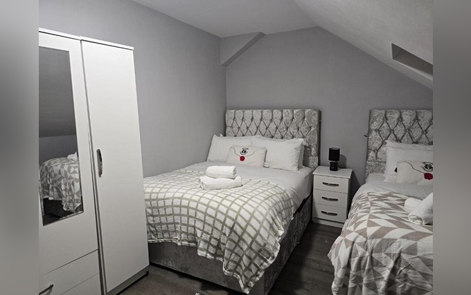A typical triple room at Heathrow Roomzz BnB