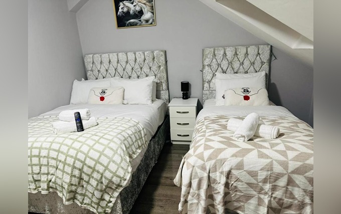 A typical triple room at Heathrow Roomzz BnB