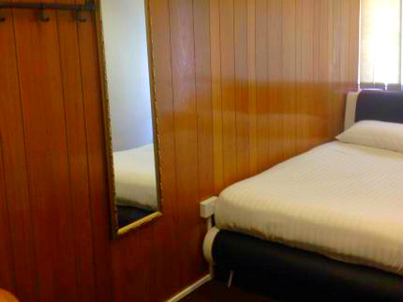 A double room at Coronation Rooms