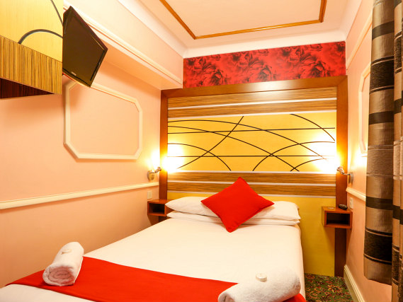Get a good night's sleep in your comfortable room at Vegas Hotel London