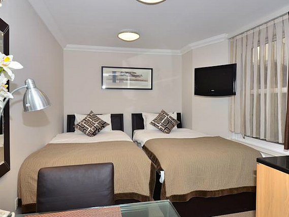 A twin room at Royal Chulan Hyde Park Hotel is perfect for two guests