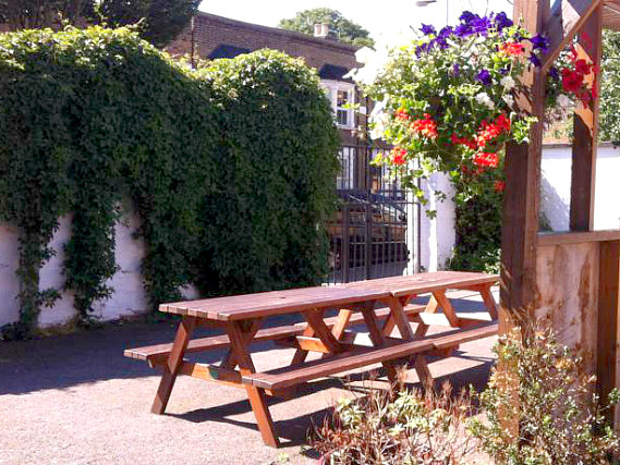 Relax in the garden area at Forest Gate Hotel