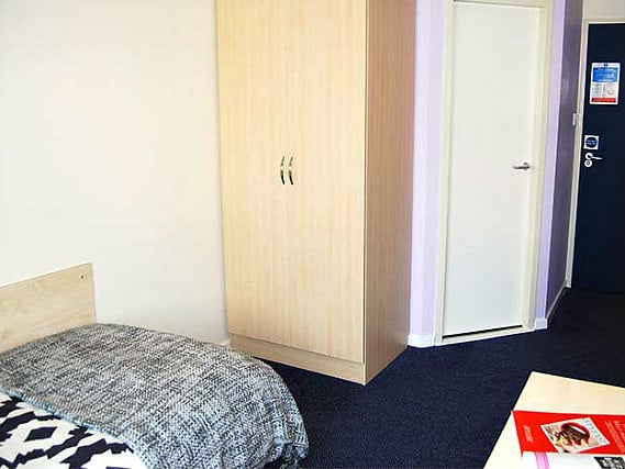 A typical single room at Dinwiddy House Budget Rooms