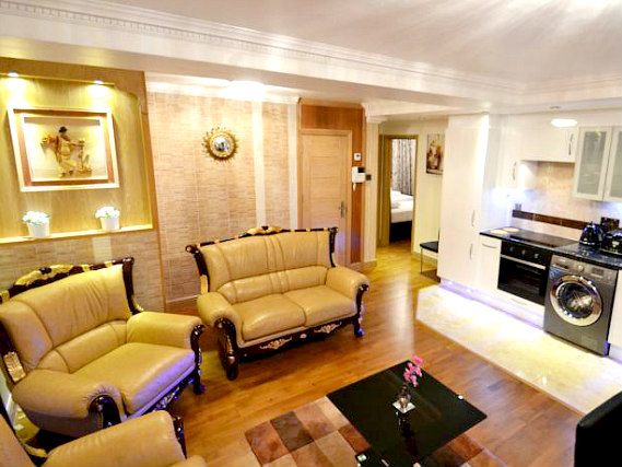 Relax in the lounge at Hyde Park Suites