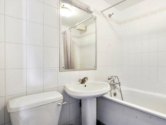 Relax in the private bathroom in your room at Access Apartments Maida Vale South