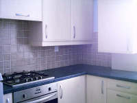 The kitchen at Ashgrove St Apartments