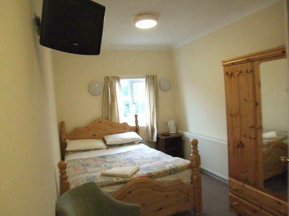 Get a good night's sleep in your comfortable room at Grove Hill Hotel