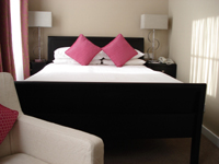 This is standard room at Berjaya Eden Park Hotel with trouser press, tea and coffee making facilities, telephone, TV and a safe.