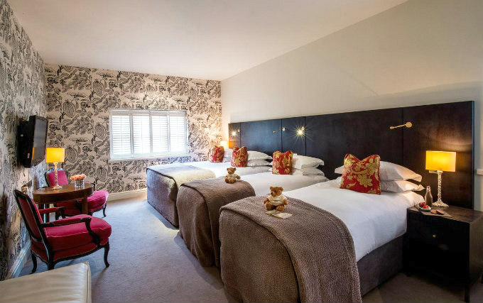 A typical quad room at The Kensington Hotel