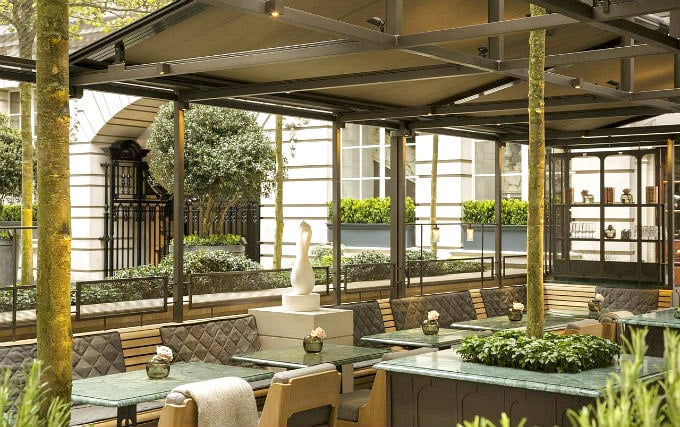 Relax and enjoy your meal in the Dining room at Rosewood London