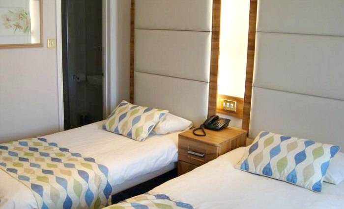 A comfortable twin rooms at Royal Eagle Hotel London