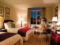 A typical twin bedroom with riverview at Marriott County Hall