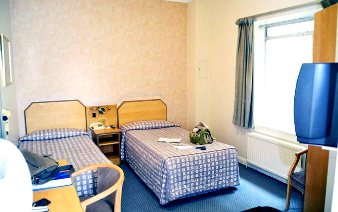 A twin room at Norfolk Plaza Hotel