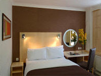 A typical double bedroom at the Strand Palace Hotel