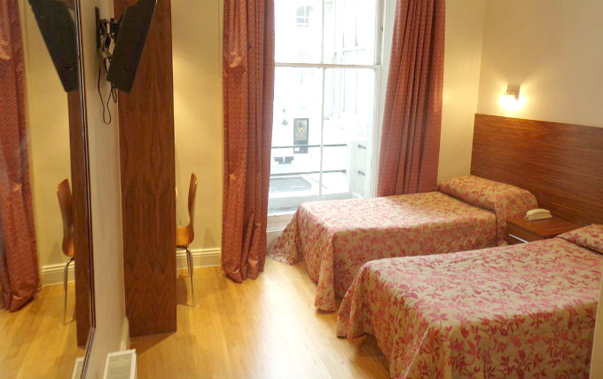 A twin room at Wedgewood Hotel London