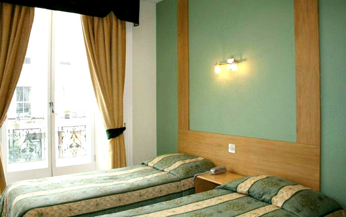 A twin room at Westbury Kensington Hotel