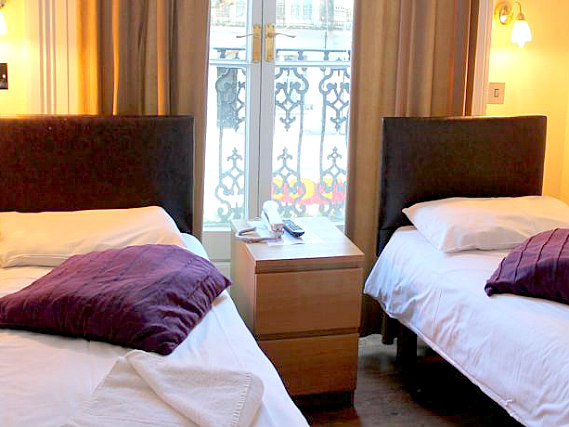 A typical twin room at New Dawn Hotel London