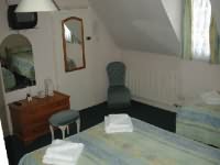 A Quad room at The Kensington Hotel