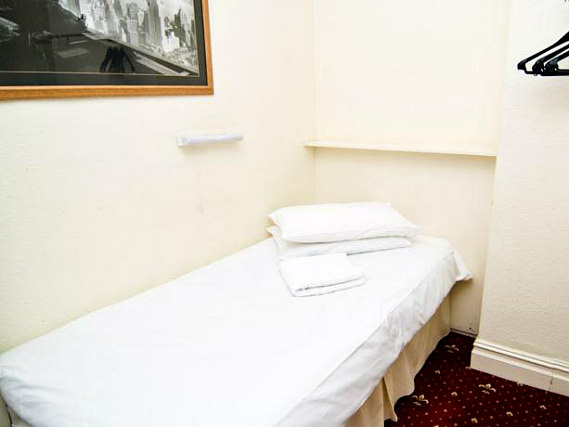 A typical single room at Five Kings Hotel