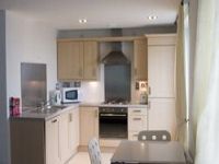 A Well Equipped Kitchen at Harbour Apartments