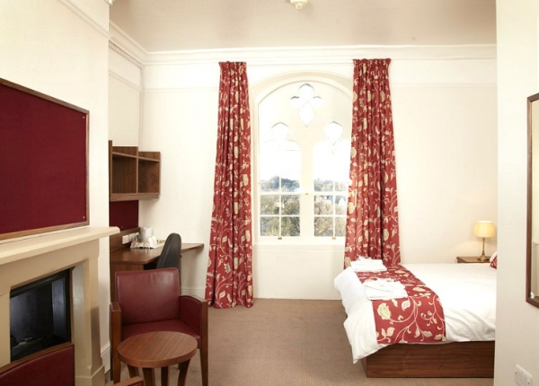 Rest easy in a comfortable bed in your room