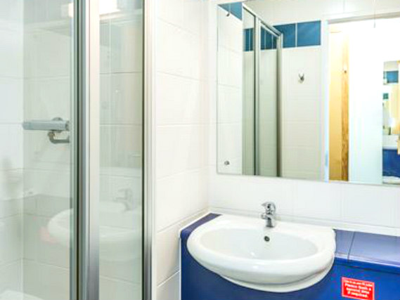 Relax in the private bathroom in your room