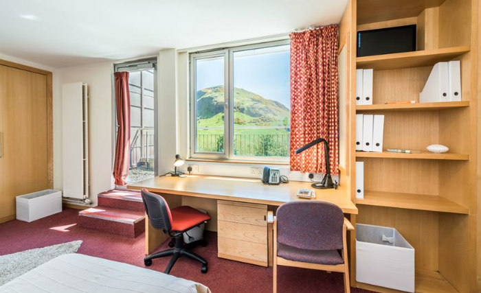 Rest easy in a comfortable bed in your room