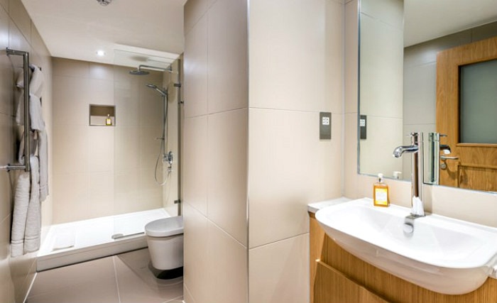 Relax in the private bathroom in your room