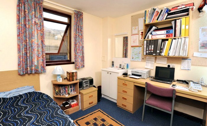 Rest easy in a comfortable bed in your room