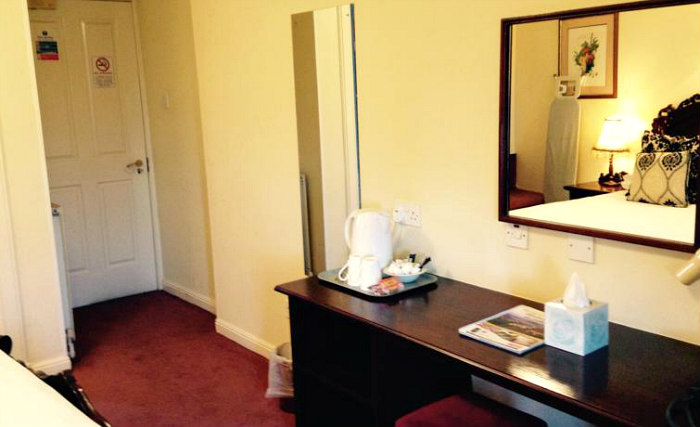 Rest easy in a comfortable bed in your room