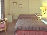 A Typical Triple Room at Osbourne Hotel