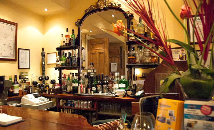 After a busy day, relax with a drink in the bar