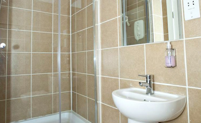 Relax in the private bathroom in your room