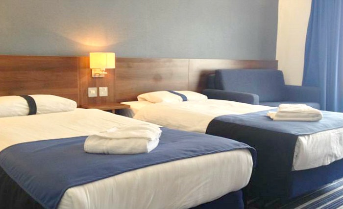 Rest easy in a comfortable bed in your room