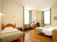 A typical triple room at Merchant City Inn
