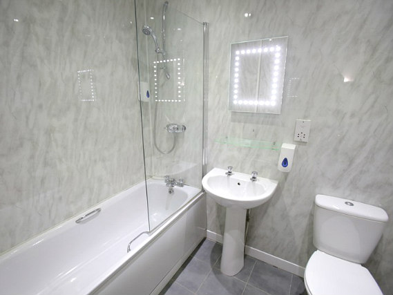 Relax in the private bathroom in your room