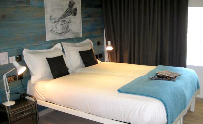 Rest easy in a comfortable bed in your room