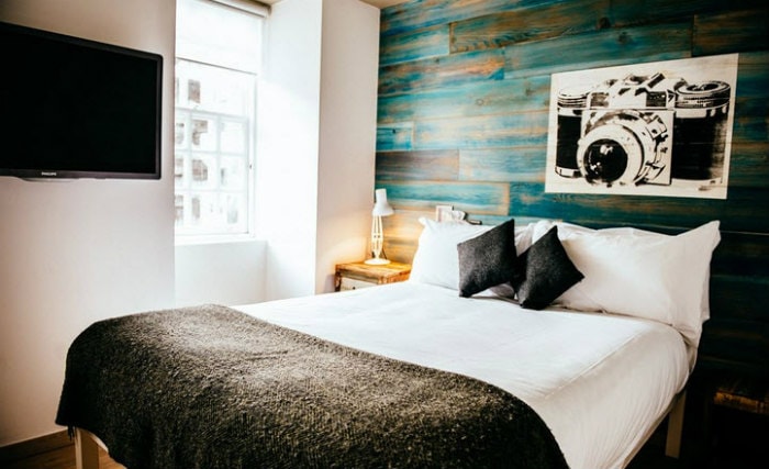 Put your feet up in front of the TV in your room