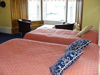 A Typical Triple Room at North Beach Hotel