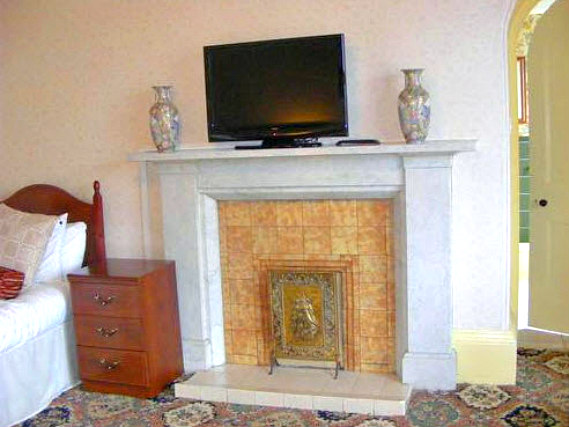 Put your feet up in front of the TV in your room