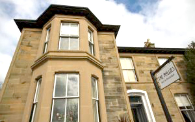 An exterior view of The Hollies