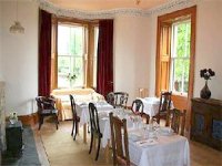 The dining room at the Hollies Hotel