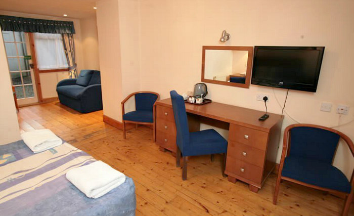 Rooms are simple but clean at Victorian House Hotel