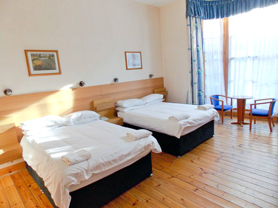 Rest easy in a comfortable bed in your room