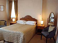 An elegantly furnished double room at the Best Inn Hotel