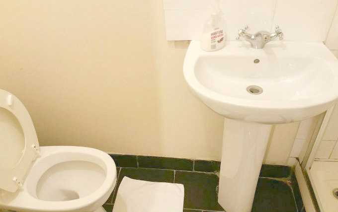 A typical bathroom at Best Inn Hotel