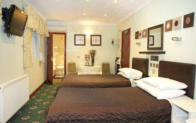 A twin room at Park Avenue Hotel London