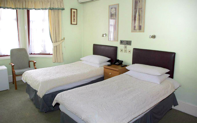 A typical twin room at Park Avenue Hotel London